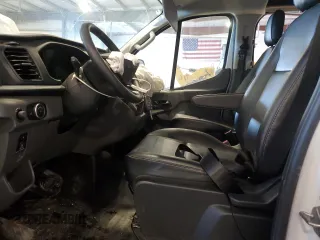 2024 Ford Transit Cargo with VIN 1FTBR1Y88RKB38322, listed as a Copart auction lot 45318395 with 1,168 mi miles and Salvage Title. Bid and sale history available at DreamBid. Image 7.