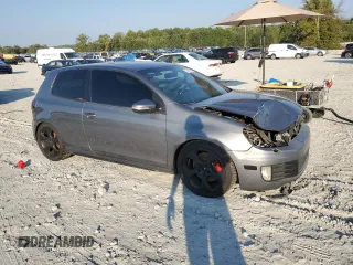 2010 Volkswagen GTI w/Sunroof with VIN WVWEV7AJ2AW239345, listed as a Copart auction lot 74179404 with 180,064 mi miles and Salvage Title. Bid and sale history available at carsss.com. Image 4.