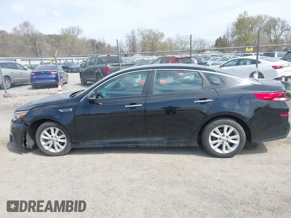 2019 Kia Optima LX with VIN 5XXGT4L33KG373375, listed as a IAAI auction lot 42005817 with 77,524 mi miles and . Bid and sale history available at carsss.com. Image 14.