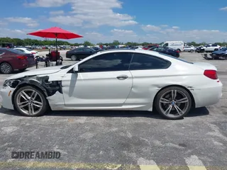 2014 BMW 6 Series 650i with VIN WBAYM9C55ED248244, listed as a IAAI auction lot 42043456 with 144,664 mi miles and . Bid and sale history available at DreamBid. Image 14.