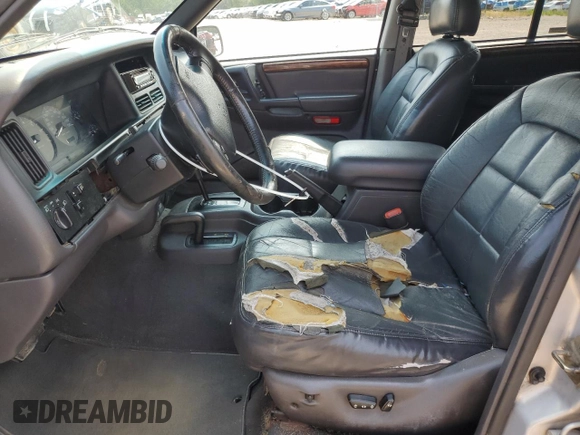 1998 Jeep Grand Cherokee Limited with VIN 1J4GZ78Y5WC324828, listed as a Copart auction lot 58992125 with 225,705 mi miles and Salvage title. Bid and sale history available at DreamBid. Image 7.