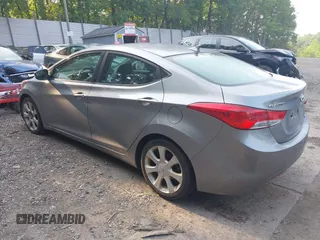 2012 Hyundai Elantra Limited with VIN KMHDH4AE0CU374001, listed as a IAAI auction lot 42394880 with 99,282 mi miles and . Bid and sale history available at DreamBid. Image 3.