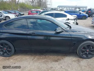 2015 BMW 4 Series 428i xDrive with VIN WBA3N5C56FK620915, listed as a IAAI auction lot 42023624 with 112,309 mi miles. Bid and sale history available at carsss.com. Image 13.