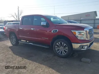 2017 Nissan Titan SV with VIN 1N6AA1E57HN558371, listed as a IAAI auction lot 41785219 with 94,828 mi miles and . Bid and sale history available at DreamBid. Image 1.
