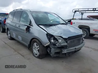 2007 Honda Odyssey EX-L z VIN 5FNRL38747B131994, wystawiony jako IAAI lot #41697311 z przebiegiem 245 012 mil mil oraz . Historia ofert i sprzedaży dostępna na DreamBid. Obrazek 1.