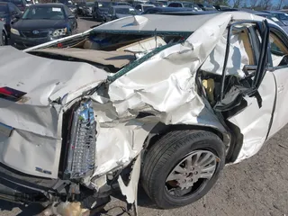 2012 Cadillac CTS Premium with VIN 1G6DS5E36C0139035, listed as a IAAI auction lot 41775266 with 176,370 mi miles and . Bid and sale history available at DreamBid. Image 12.