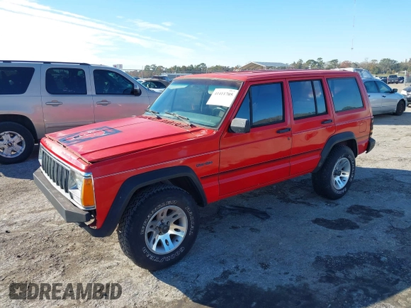 1996 Jeep Cherokee SE with VIN 1J4FT28S0TL225891, listed as a IAAI auction lot 41411705 with 233,983 mi miles and . Bid and sale history available at DreamBid. Image 2.