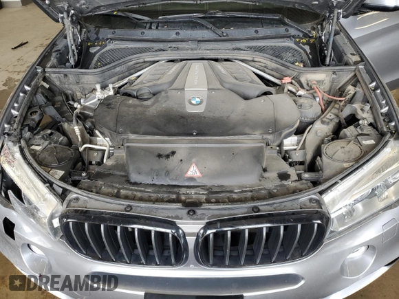 2017 BMW X5 xDrive50i z VIN 5UXKR6C35H0U12982, wystawiony jako Copart lot #57163565 z przebiegiem 121 906 mil mil oraz Szkoda całkowita • Salvage title. Historia ofert i sprzedaży dostępna na DreamBid. Obrazek 12.