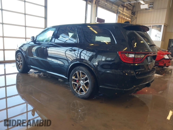 2021 Dodge Durango R/T with VIN 1C4SDJCT1MC788493, listed as a IAAI auction lot 41213673 with 80,287 mi miles and . Bid and sale history available at DreamBid. Image 3.