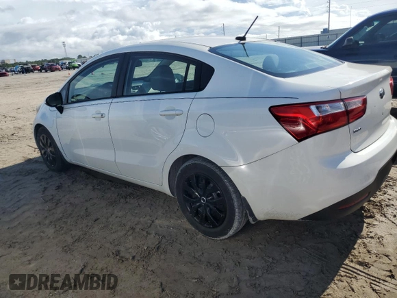 2015 Kia Rio LX with VIN KNADM4A38F6436457, listed as a Copart auction lot 68740994 with 87,474 mi miles and Salvage Title. Bid and sale history available at carsss.com. Image 2.