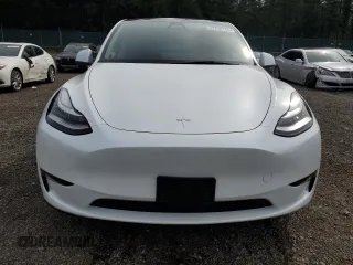 2023 Tesla Model Y Long Range with VIN 7SAYGDEE6PA101291, listed as a Copart auction lot 52758115 with 7,250 mi miles and Salvage Title. Bid and sale history available at DreamBid. Image 5.