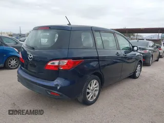 2014 Mazda Mazda5 Sport with VIN JM1CW2BL5E0176659, listed as a IAAI auction lot 41544945 with 102,691 mi miles. Bid and sale history available at carsss.com. Image 4.