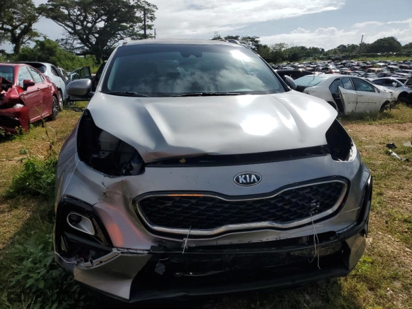 2020 Kia Sportage LX with VIN KNDPM3AC6L7703983, listed as a Copart auction lot 65364074 with 0 mi miles and Salvage Title. Bid and sale history available at carsss.com. Image 5.