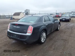 2013 Chrysler 300 with VIN 2C3CCAKG7DH619334, listed as a IAAI auction lot 41193765 with 162,662 mi miles. Bid and sale history available at carsss.com. Image 4.
