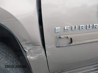 2007 Chevrolet Suburban LS with VIN 1GNFC16JX7R225286, listed as a IAAI auction lot 41594303 with 213,648 mi miles. Bid and sale history available at carsss.com. Image 14.