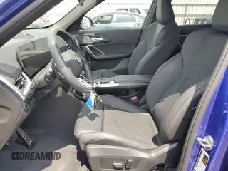 2024 BMW X1 xDrive28i with VIN WBX73EF06R5007063, listed as a Copart auction lot 56143075 with 2,947 mi miles and Salvage title. Bid and sale history available at DreamBid. Image 7.