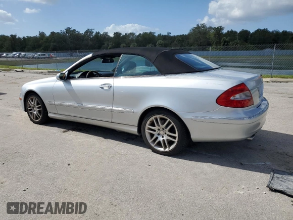 2009 Mercedes-Benz CLK-Class 3.5L with VIN WDBTK56F69T105071, listed as a Copart auction lot 77170654 with 70,688 mi miles and Salvage Title. Bid and sale history available at carsss.com. Image 2.