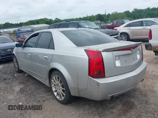 2006 Cadillac CTS z VIN 1G6DP577560184909, wystawiony jako IAAI lot #42153050 z przebiegiem 234 316 mil mil oraz . Historia ofert i sprzedaży dostępna na DreamBid. Obrazek 3.