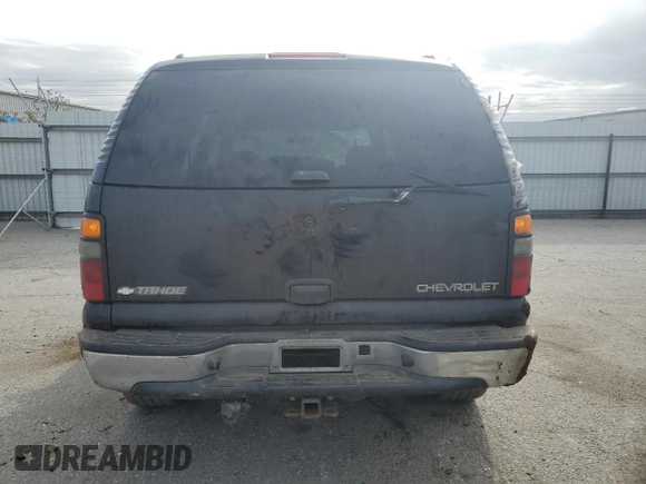 2005 Chevrolet Tahoe LS with VIN 1GNEC13V15R239318, listed as a Copart auction lot 50660895 with 126,724 mi miles and Salvage title. Bid and sale history available at DreamBid. Image 6.