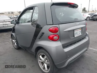 2015 Smart fortwo Passion with VIN WMEEJ3BA1FK787744, listed as a IAAI auction lot 42095001 with 43,370 mi miles and . Bid and sale history available at DreamBid. Image 3.