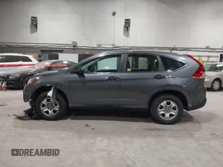 2014 Honda CR-V LX with VIN 2HKRM4H36EH604289, listed as a IAAI auction lot 42094226 with 149,540 mi miles. Bid and sale history available at carsss.com. Image 14.