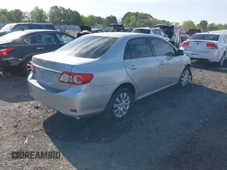 2013 Toyota Corolla L with VIN 5YFBU4EE7DP166021, listed as a IAAI auction lot 42027062 with 179,107 mi miles and . Bid and sale history available at DreamBid. Image 4.