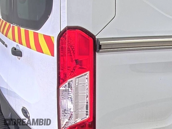 2019 Ford Transit with VIN 1FTYE1YM0KKB31938, listed as a IAAI auction lot 42667322 with 196,239 mi miles and . Bid and sale history available at DreamBid. Image 16.