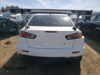 2015 Mitsubishi Lancer Evolution GSR z VIN JA32W8FV3FU022955, wystawiony jako Copart lot #50692924 z przebiegiem 88 882 mil mil oraz . Historia ofert i sprzedaży dostępna na DreamBid. Obrazek 6.
