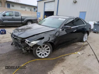 2014 Cadillac CTS RWD z VIN 1G6AP5SX6E0193868, wystawiony jako Copart lot #51795485 z przebiegiem 100 039 mil mil oraz Szkoda całkowita • Salvage title. Historia ofert i sprzedaży dostępna na DreamBid. Obrazek 1.