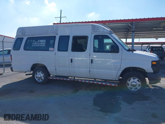 2012 Ford Econoline Cargo Commercial with VIN 1FTNS2EW4CDA50633, listed as a IAAI auction lot 40694015 with 309,334 mi miles. Bid and sale history available at carsss.com. Image 13.