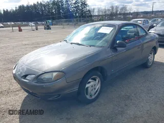 2002 Ford Escort ZX2 Standard with VIN 3FAFP11312R202665, listed as a IAAI auction lot 41721037 with 170,586 mi miles. Bid and sale history available at carsss.com. Image 2.
