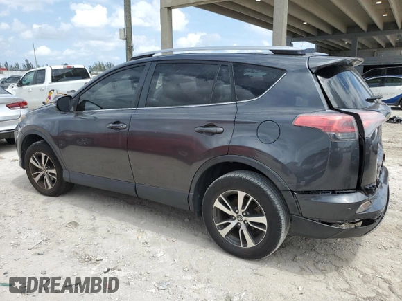 2018 Toyota RAV4 XLE with VIN JTMWFREV1JJ742694, listed as a Copart auction lot 51093695 with 74,502 mi miles and Salvage Title. Bid and sale history available at DreamBid. Image 2.