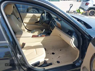 2013 BMW 3 Series 328i with VIN WBA3C1G53DNR44943, listed as a IAAI auction lot 41769496 with 131,700 mi miles and . Bid and sale history available at carsss.com. Image 5.