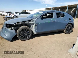 2019 Mazda Mazda3 Hatchback w/Premium Pkg with VIN JM1BPBNM7K1124047, listed as a Copart auction lot 53030435 with 66,973 mi miles and Salvage Title. Bid and sale history available at carsss.com. Image 1.