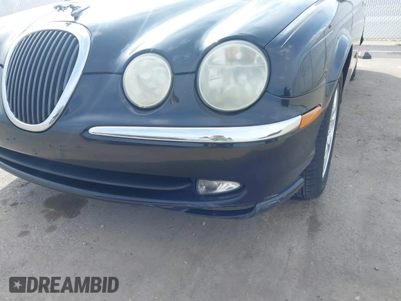 2003 Jaguar S-Type with VIN SAJEA01T93FM64497, listed as a IAAI auction lot 41804705 with 224,978 mi miles and . Bid and sale history available at DreamBid. Image 6.