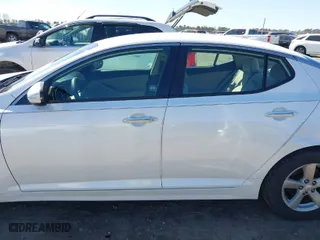 2015 Kia Optima LX with VIN KNAGM4A71F5639969, listed as a IAAI auction lot 41761427 with 157,967 mi miles. Bid and sale history available at carsss.com. Image 14.