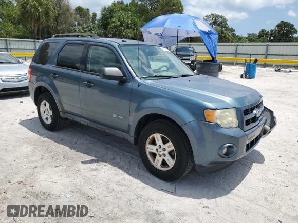 2011 Ford Escape Hybrid with VIN 1FMCU5K31BKB86253, listed as a Copart auction lot 57509525 with 159,486 mi miles and Salvage title. Bid and sale history available at DreamBid. Image 4.