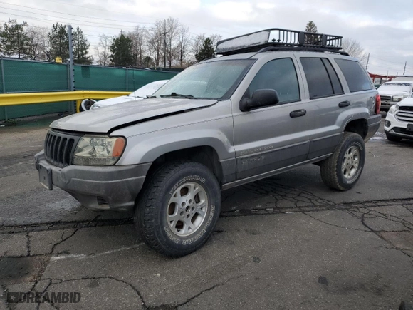 2001 Jeep Grand Cherokee Laredo with VIN 1J4GW48SX1C607432, listed as a Copart auction lot 51649365 with 296,308 mi miles and Salvage Title. Bid and sale history available at carsss.com. Image 1.