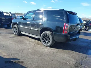 2014 GMC Yukon Denali with VIN 1GKS2EEF9ER140584, listed as a IAAI auction lot 41688659 with 81,995 mi miles. Bid and sale history available at carsss.com. Image 3.