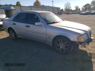 2000 Mercedes-Benz C 230 Kompressor with VIN WDBHA24G5YF935573, listed as a Copart auction lot 76331604 with 261,917 mi miles and Salvage Title. Bid and sale history available at carsss.com. Image 4.