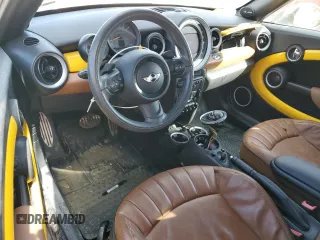 2015 MINI Roadster S z VIN WMWSY3C53FT595389, wystawiony jako Copart lot #77476814 z przebiegiem Nie podano mil oraz Szkody całkowita. Historia ofert i sprzedaży dostępna na DreamBid. Obrazek 8.