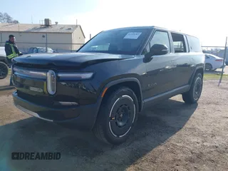 2025 Rivian R1S Adventure with VIN 7PDSGBBAXSN055849, listed as a IAAI auction lot 41255282 with 2,885 mi miles. Bid and sale history available at carsss.com. Image 18.