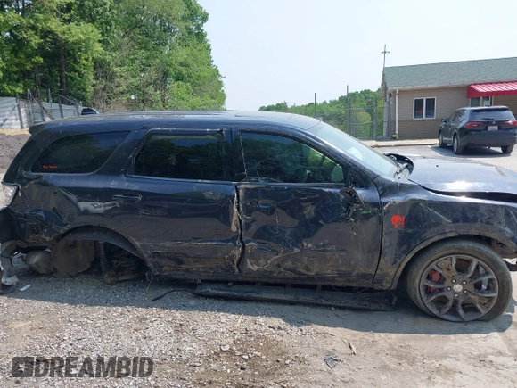 2015 Dodge Durango R/T with VIN 1C4SDJCT1FC832916, listed as a IAAI auction lot 42401260 with Not provided miles and . Bid and sale history available at DreamBid. Image 13.