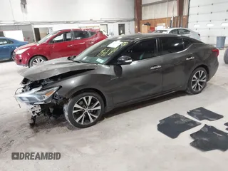 2016 Nissan Maxima Platinum with VIN 1N4AA6AP3GC404618, listed as a IAAI auction lot 42372458 with 133,968 mi miles and . Bid and sale history available at DreamBid. Image 2.