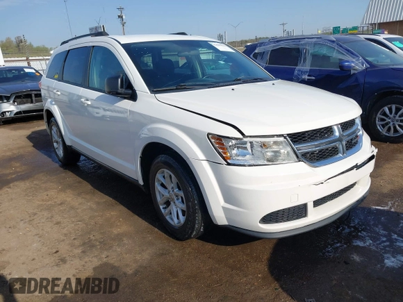 2014 Dodge Journey SE with VIN 3C4PDCAB0ET293641, listed as a IAAI auction lot 42001844 with 138,740 mi miles. Bid and sale history available at carsss.com. Image 1.