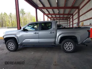 2025 Toyota Tacoma SR with VIN 3TMLB5JN7SM100983, listed as a IAAI auction lot 42220559 with 2,119 mi miles and . Bid and sale history available at DreamBid. Image 15.