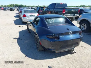2021 Mazda MX-5 Miata Grand Touring with VIN JM1NDAM7XM0455743, listed as a IAAI auction lot 42067373 with 28,255 mi miles and . Bid and sale history available at DreamBid. Image 3.