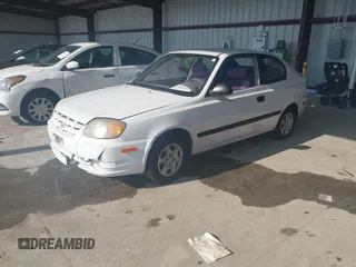 2004 Hyundai Accent with VIN KMHCF35C94U315390, listed as a IAAI auction lot 41391877 with 162,406 mi miles. Bid and sale history available at carsss.com. Image 2.