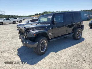 2007 Jeep Wrangler Unlimited Sahara with VIN 1J8GA59117L196598, listed as a Copart auction lot 59620195 with 111,280 mi miles and Salvage title. Bid and sale history available at DreamBid. Image 1.