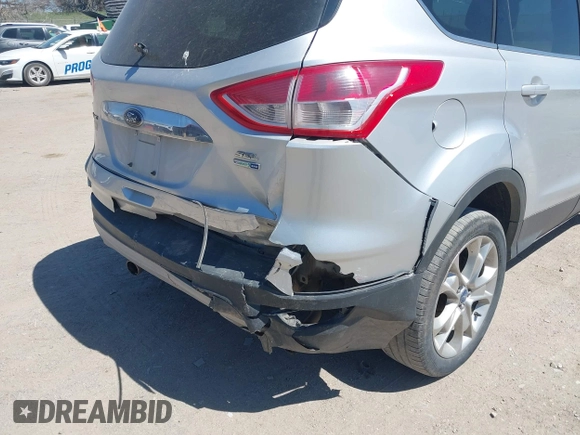 2013 Ford Escape SEL with VIN 1FMCU9H91DUA14749, listed as a IAAI auction lot 42039685 with 186,669 mi miles. Bid and sale history available at carsss.com. Image 6.